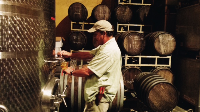Steve Wood pouring his Farnum Hill Cider strait out of the vat